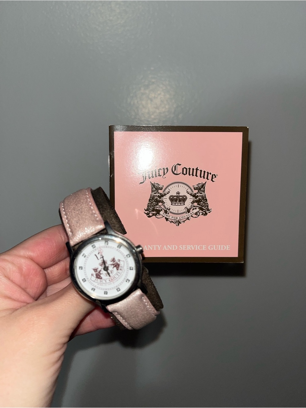 Juicy Couture Pale Pink Leather Strap Round Crest Dial Watch